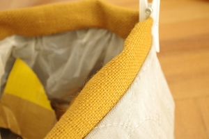 Folded down basket lip - here with a peg to keep lip and bin bag in place